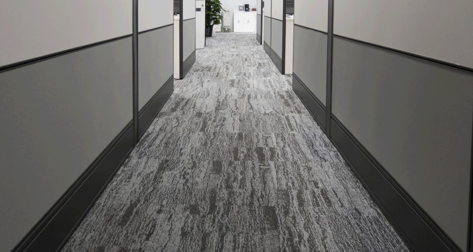 Looking down the row of a commercial carpet office space.